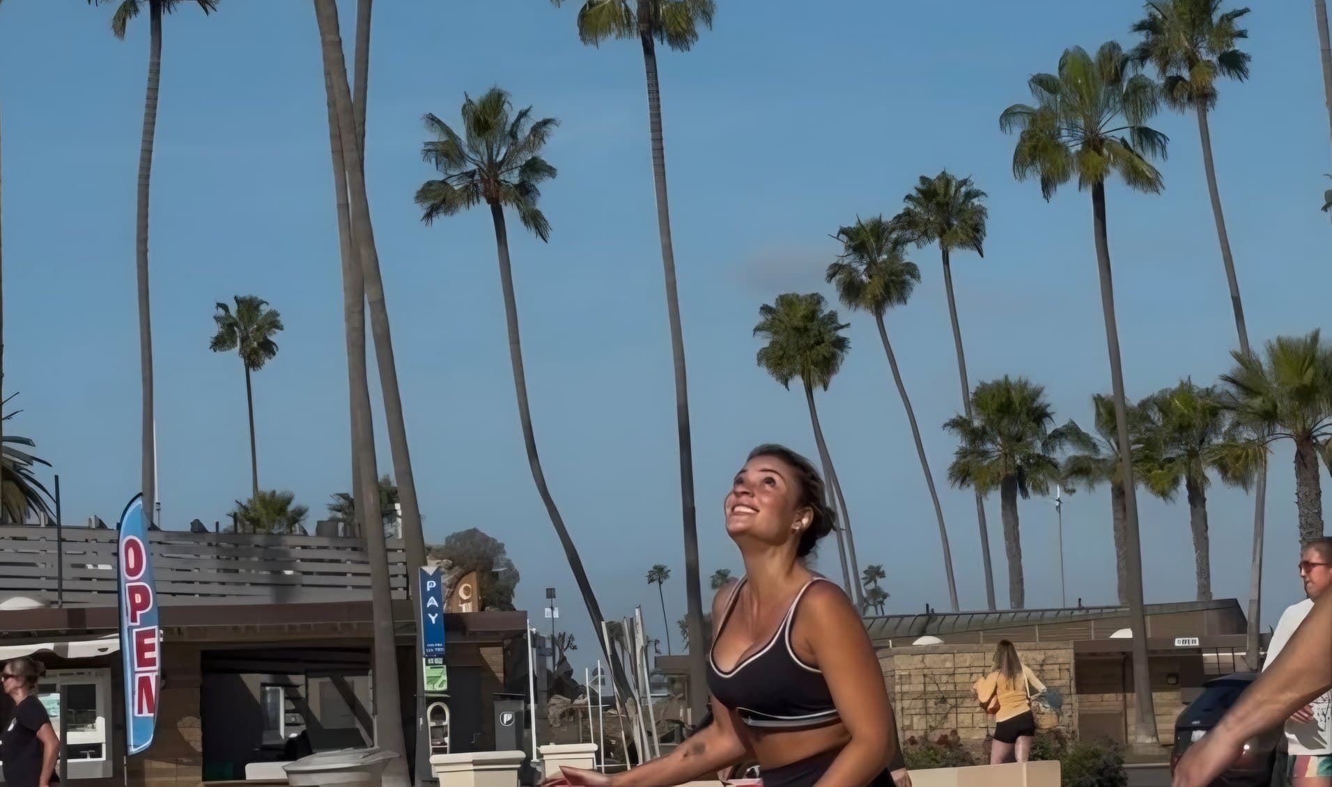 Footvolley under the palm trees in Southern California