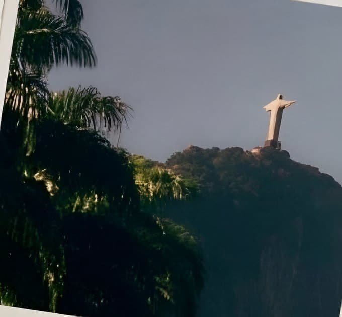 Christ the Redeemer seen through the trees in Rio de Janeiro